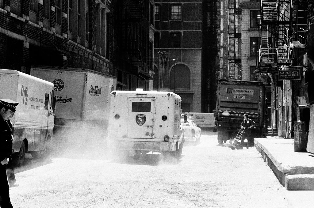 John Wayne Gacy is transferred to a van under heavy security after a brain scan - Gene Pesek for Chicago Sun-Times