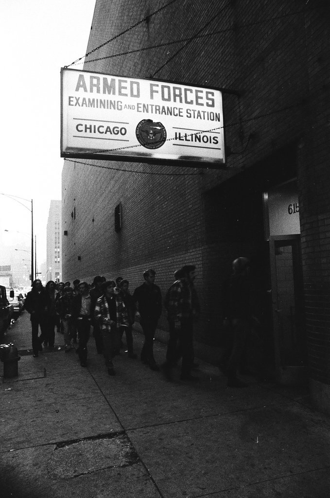 Group walking from Northwest Railroad Station to army induction center - Chicago Sun-Times