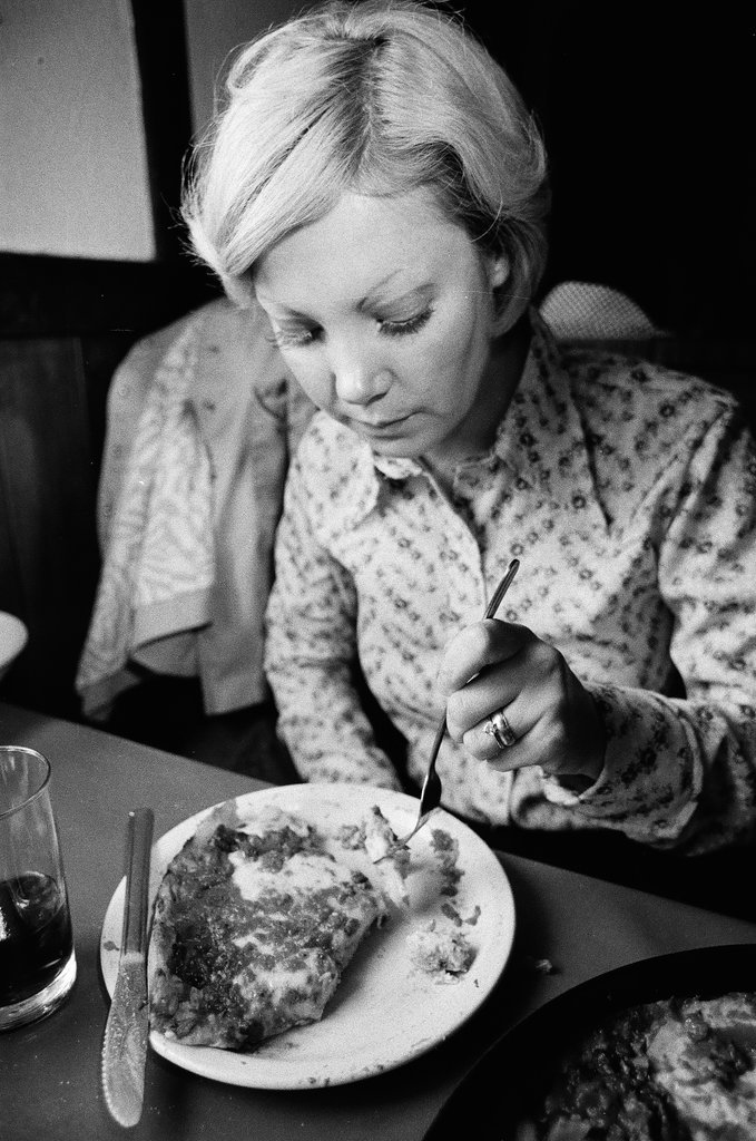 Woman eating deep-dish pizza at Pizzeria Due - Chicago Sun-Times