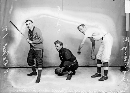 Humboldt Park Swedish Methodist indoor baseball players G. De Mol, E. Johnson, and Jack Hoenig posing in front of a backdrop - Chicago Daily News, Inc.