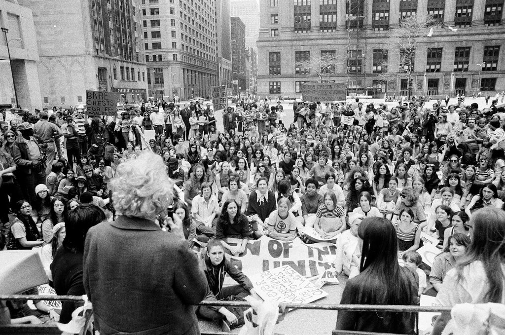 Women participate in a liberation march and rally at the Civic Center - Chicago Sun-Times
