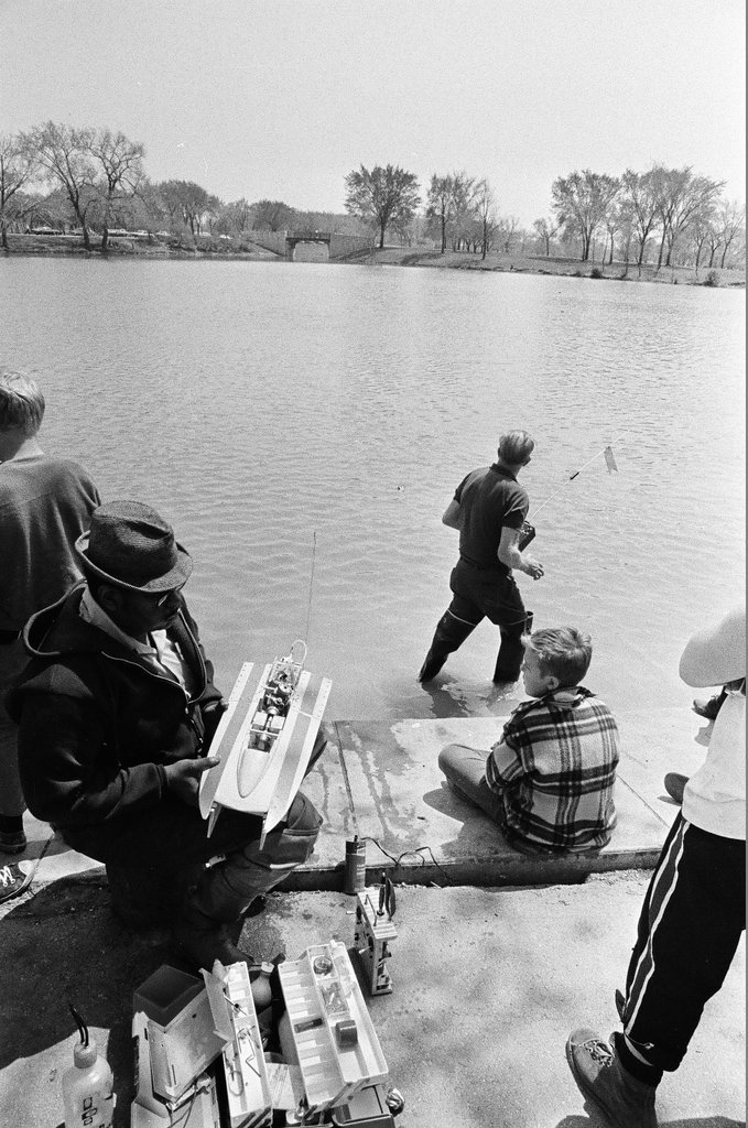 Kids climb play structures while other groups set up fishing equipment at Marquette Park - Chicago Sun-Times