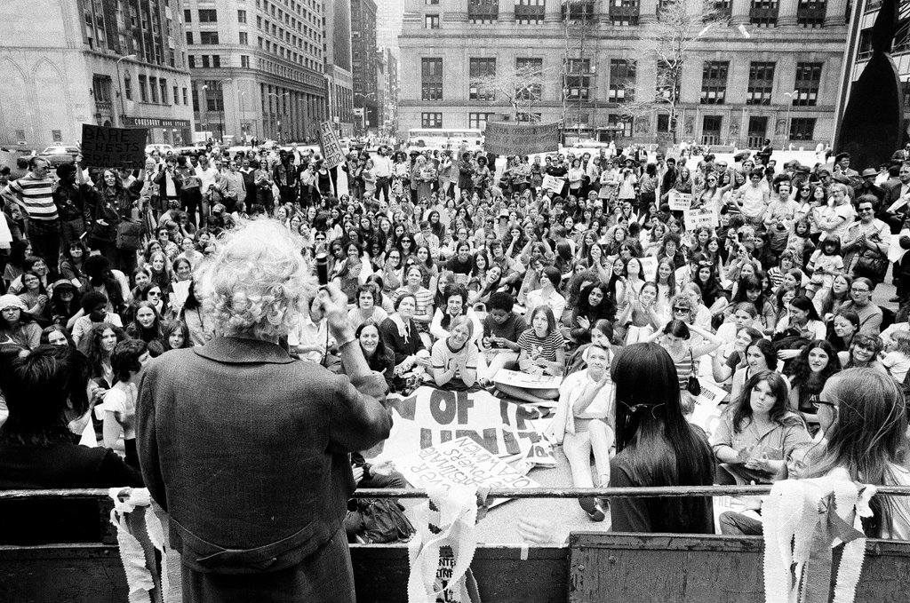 Women participate in a liberation march and rally at the Civic Center - Chicago Sun-Times