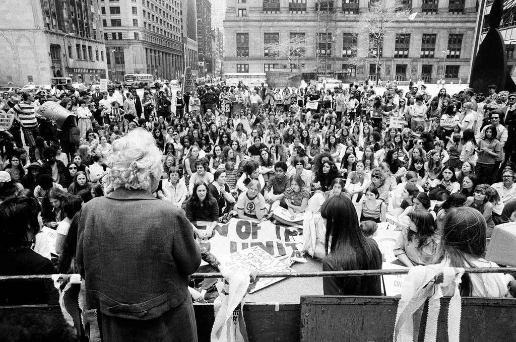 Women participate in a liberation march and rally at the Civic Center - Chicago Sun-Times