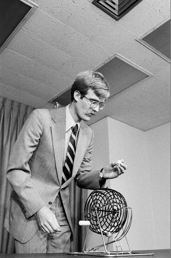 Anthony Dean reads the first numbered ball for the commercial fishing lottery - Chicago Sun-Times