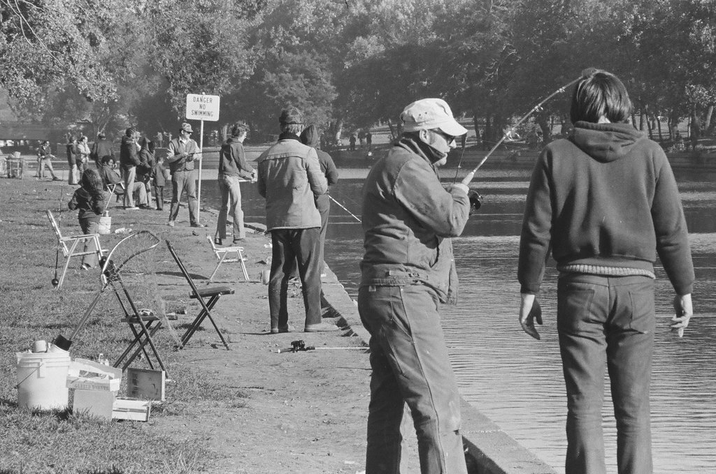People fish at the Lincoln Park Lagoon on a fall day - Chicago Sun-Times