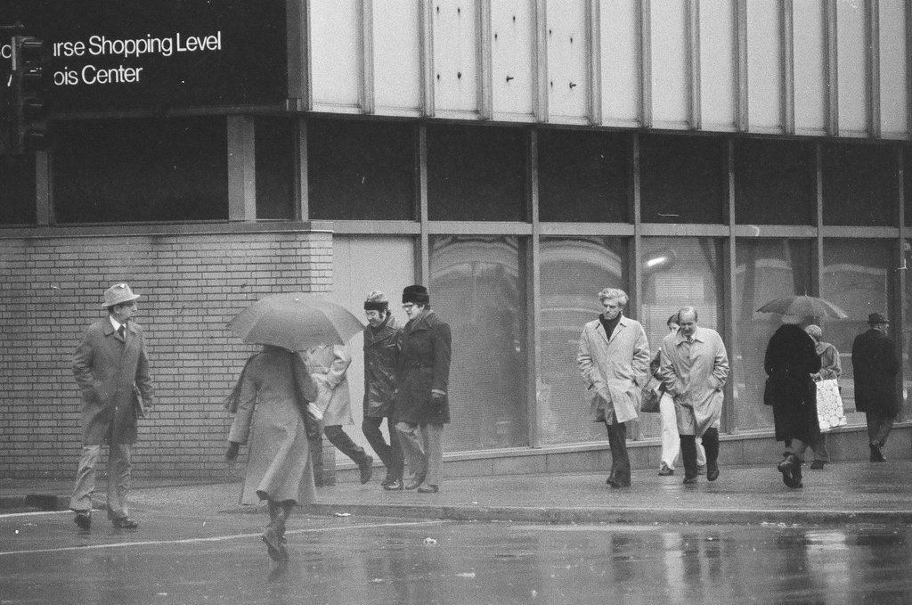 Commuters navigate heavy wind and rain in the Loop - Chicago Sun-Times