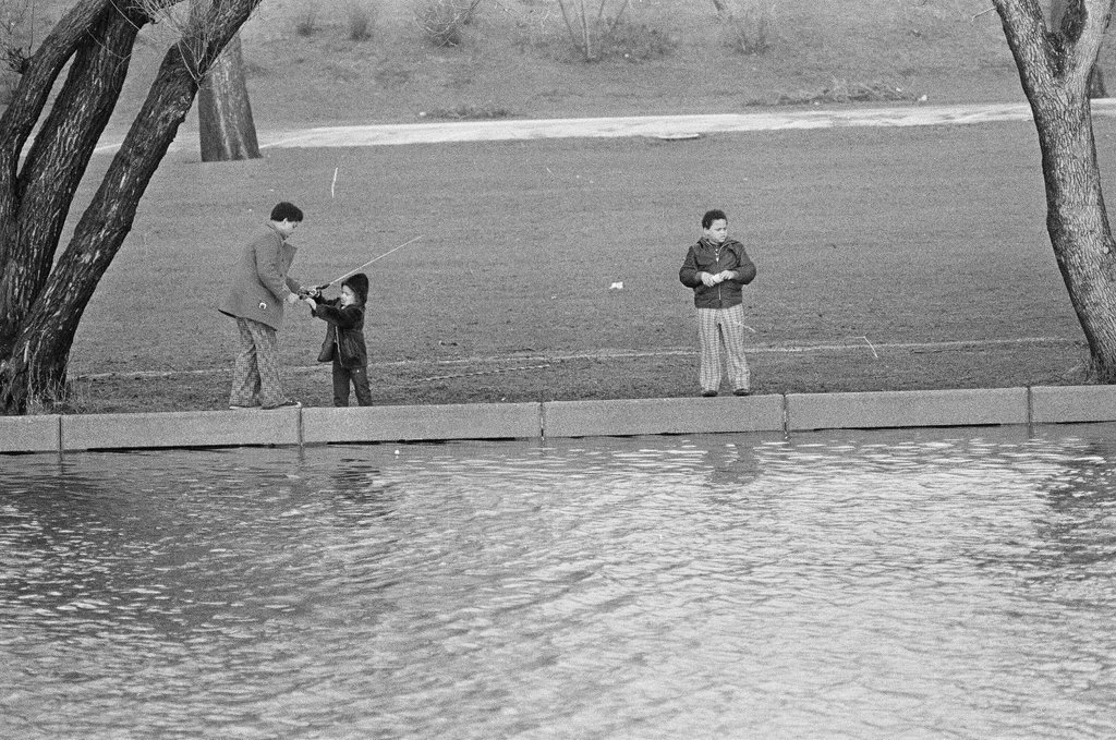 Children fish at the Lincoln Park Lagoon - Chicago Sun-Times