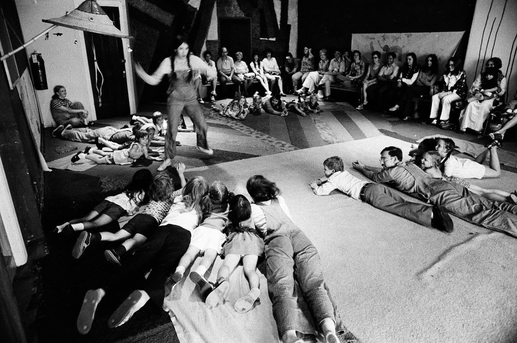 Children enjoy a participatory theater program with the Hard Core Mime Troupe - Chicago Sun-Times