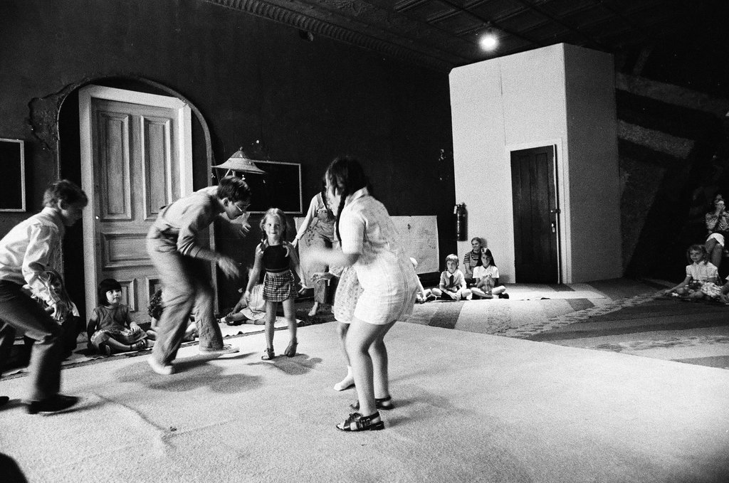 Children enjoy a participatory theater program with the Hard Core Mime Troupe - Chicago Sun-Times