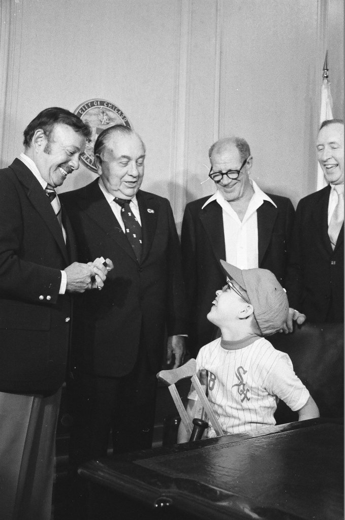 Mayor Daley presents Sox tickets to family - Henry Herr Gill for Chicago Sun-Times