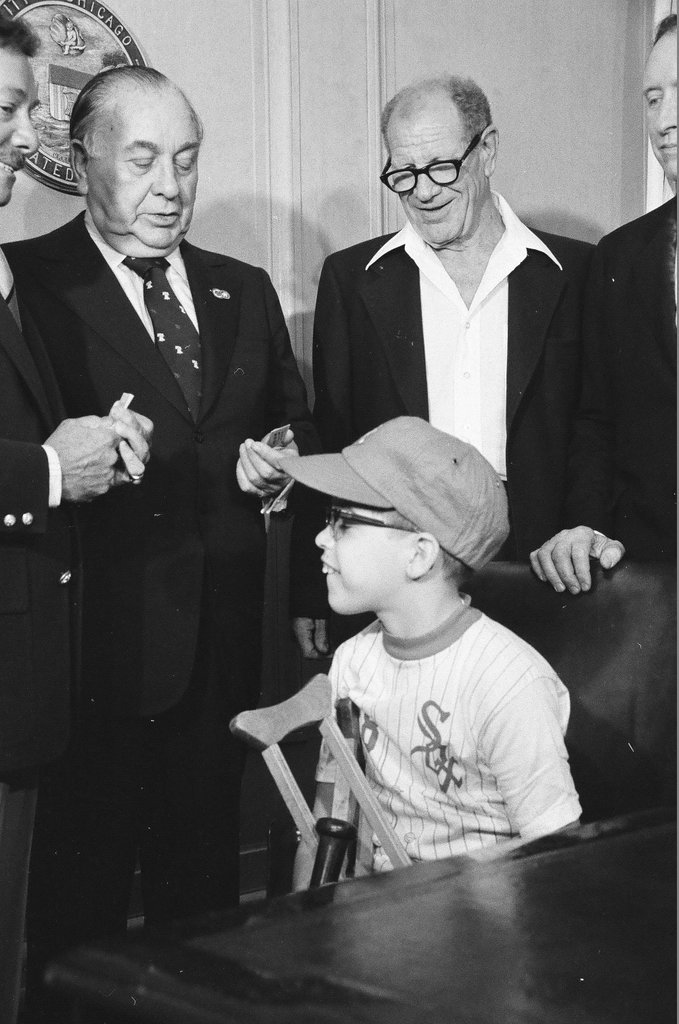 Mayor Daley presents Sox tickets to family - Henry Herr Gill for Chicago Sun-Times