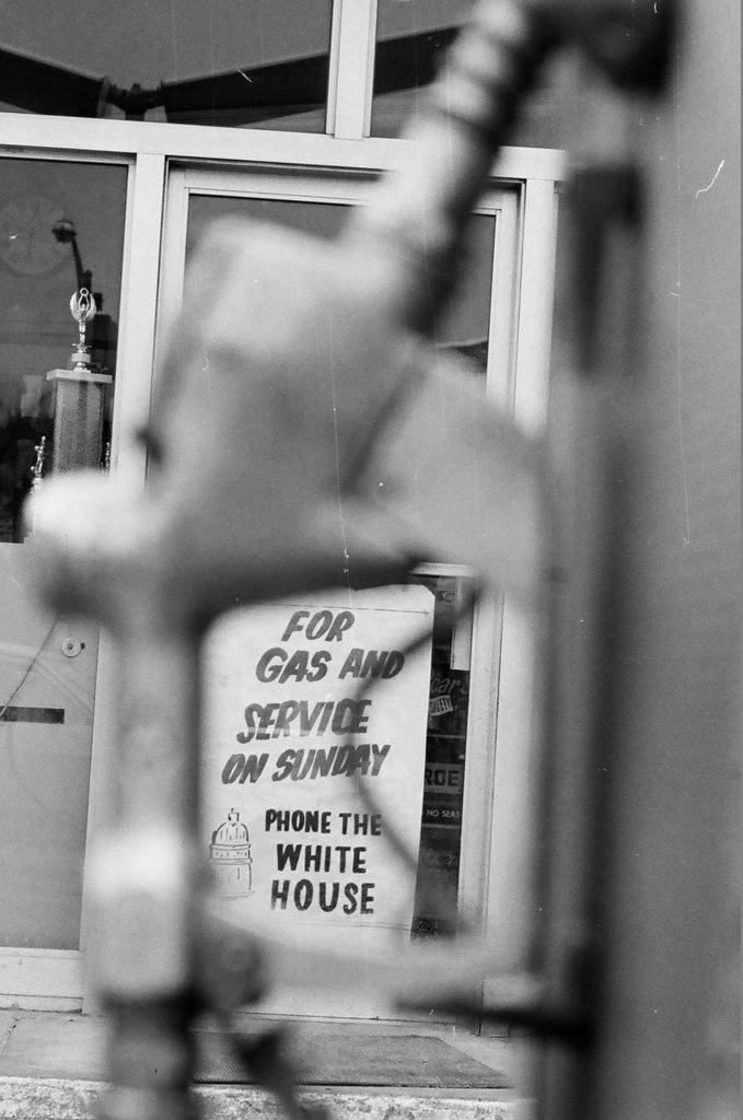 A gas station sign attempts to keep car owners in good spirits during the fuel shortage - Bob Fila for Chicago Sun-Times