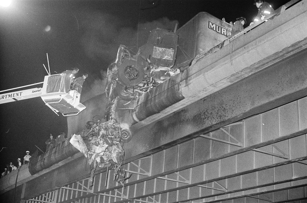 Emergency crews recover the remains of a vehicle on the expressway - Chicago Sun-Times