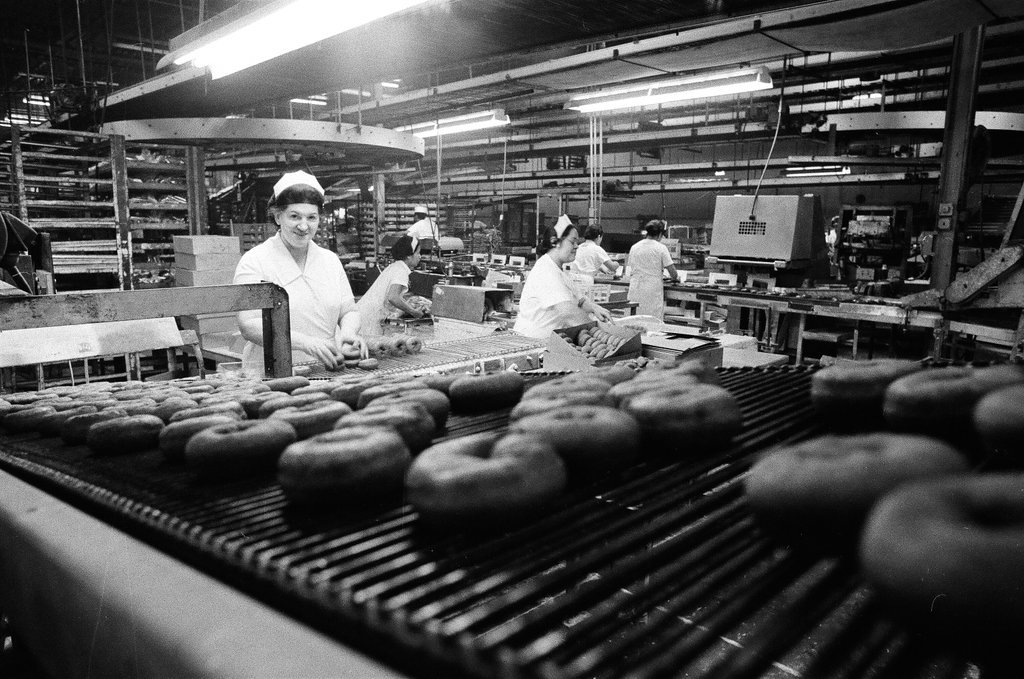 Views of the assembly process at the Buttermaid Bakeries donut plant - Chicago Sun-Times