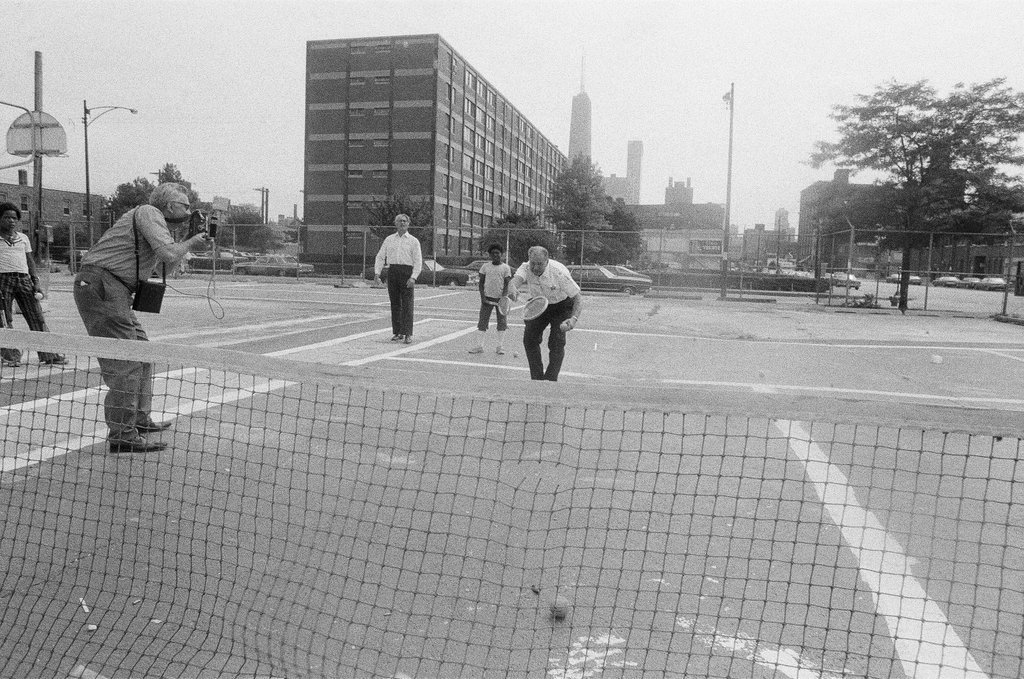 Members of the Cabrini Green Community Sandlot Tennis Club practice tennis - Chicago Sun-Times