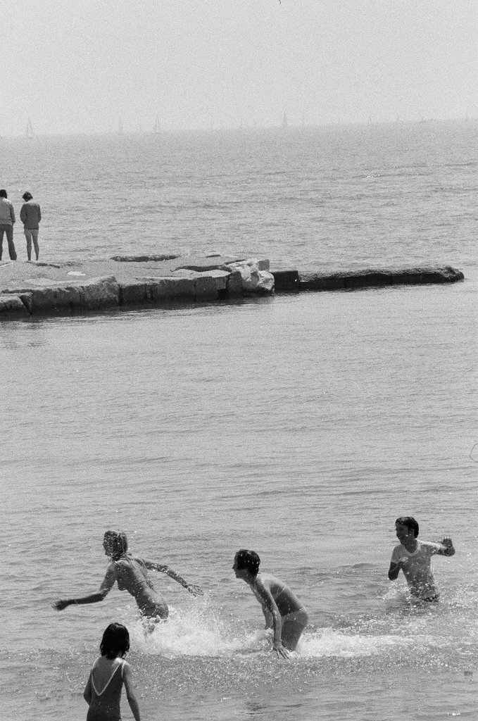 People enjoy a summer day at 12th Street Beach - Chicago Sun-Times