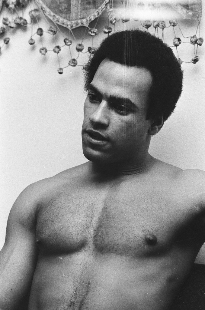 Huey P. Newton on couch - Chicago Sun-Times