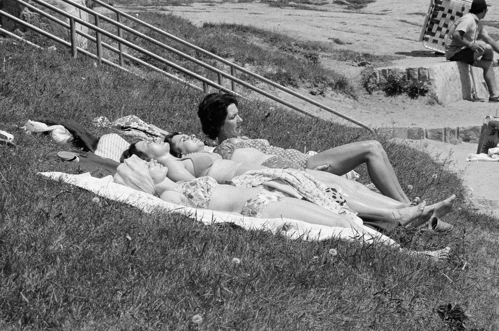 People enjoy a summer day at 12th Street Beach - Chicago Sun-Times