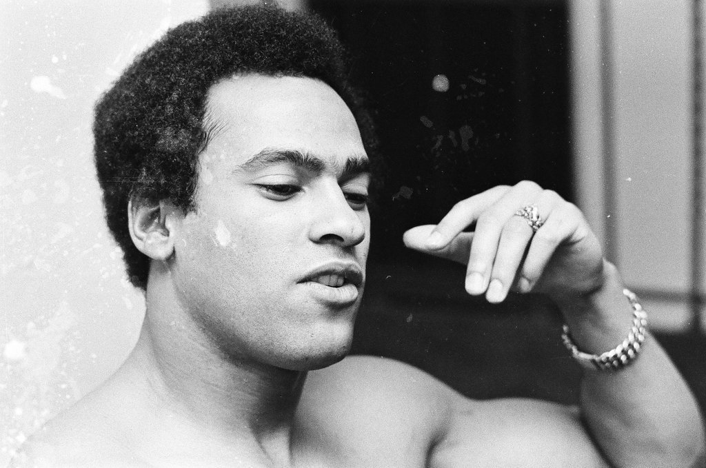 Huey P. Newton on couch - Chicago Sun-Times