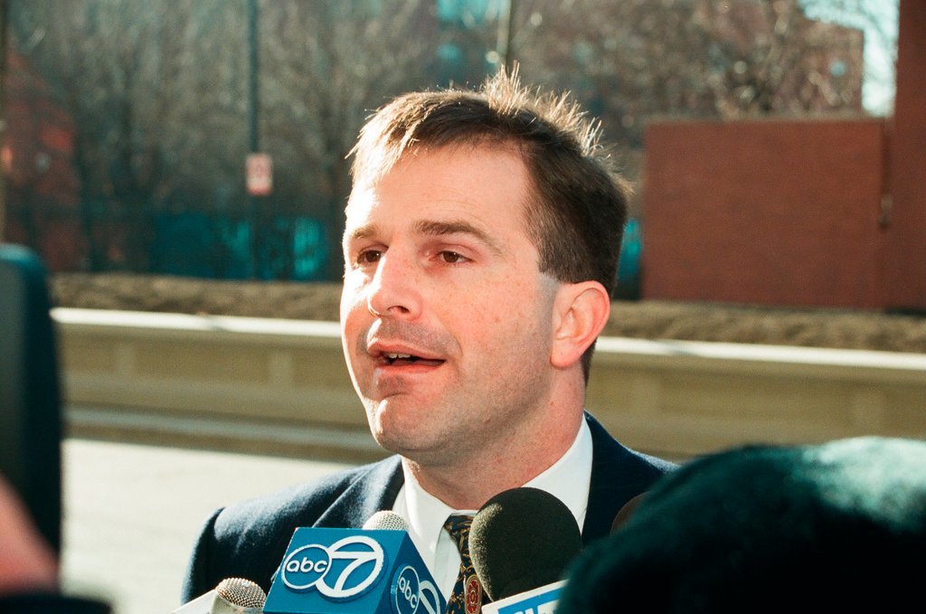 An attorney speaks with the press following a Police Board hearing regarding the beating of Jeremiah Mearday - Chicago Sun-Times