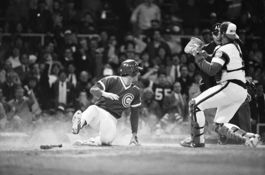 Mayor Harold Washington throws the opening pitch for a baseball game of the Cubs against the White Sox - Chicago Sun-Times