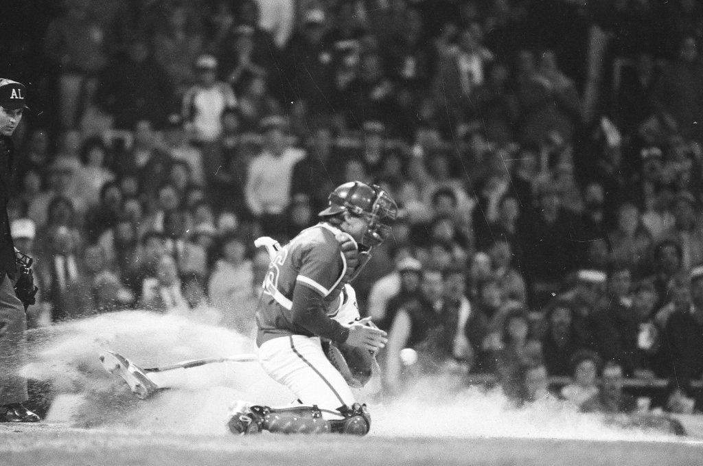 Mayor Harold Washington throws the opening pitch for a baseball game of the Cubs against the White Sox - Chicago Sun-Times