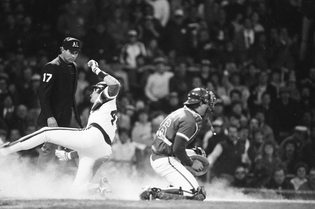 Mayor Harold Washington throws the opening pitch for a baseball game of the Cubs against the White Sox - Chicago Sun-Times