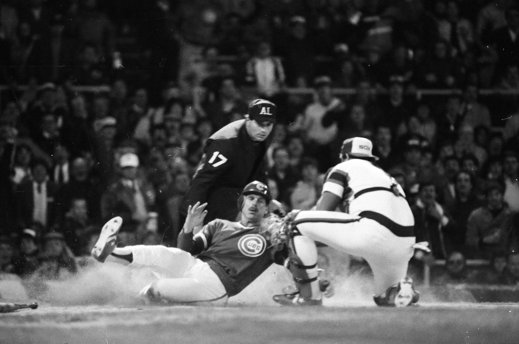 Mayor Harold Washington throws the opening pitch for a baseball game of the Cubs against the White Sox - Chicago Sun-Times