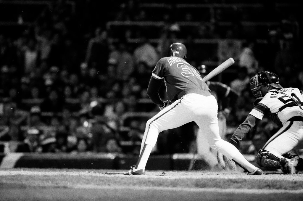 Mayor Harold Washington throws the opening pitch for a baseball game of the Cubs against the White Sox - Chicago Sun-Times