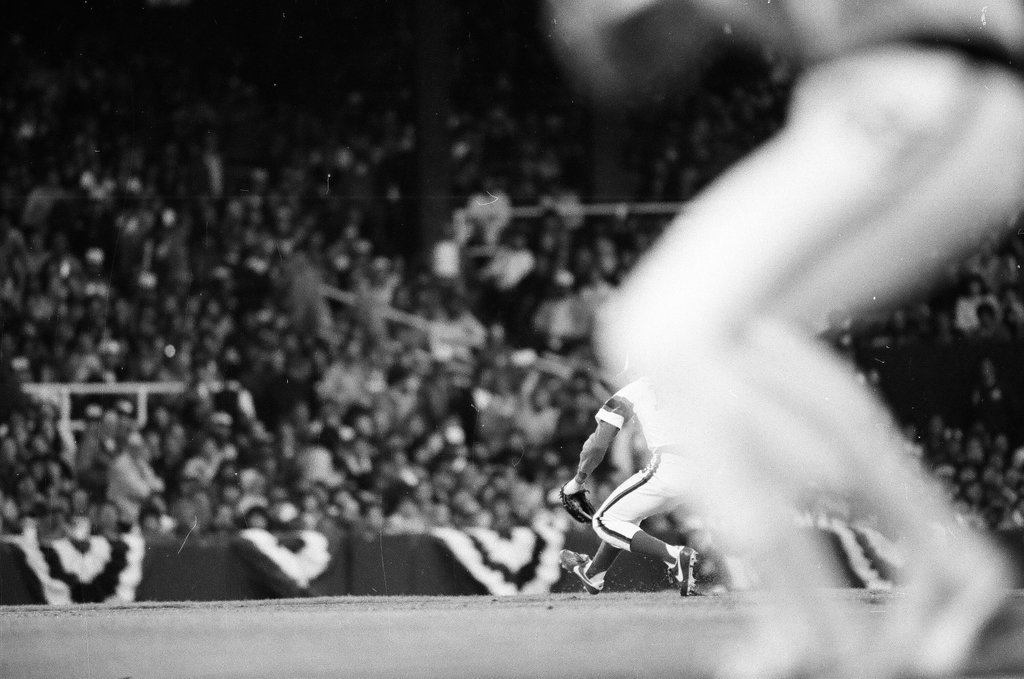 Mayor Harold Washington throws the opening pitch for a baseball game of the Cubs against the White Sox - Chicago Sun-Times
