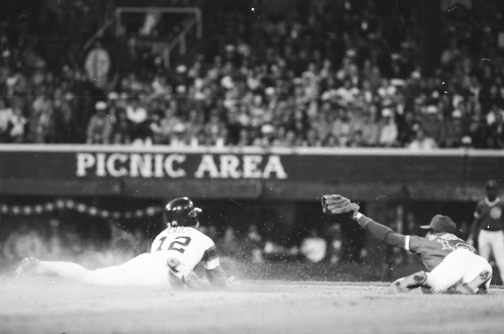 Mayor Harold Washington throws the opening pitch for a baseball game of the Cubs against the White Sox - Chicago Sun-Times