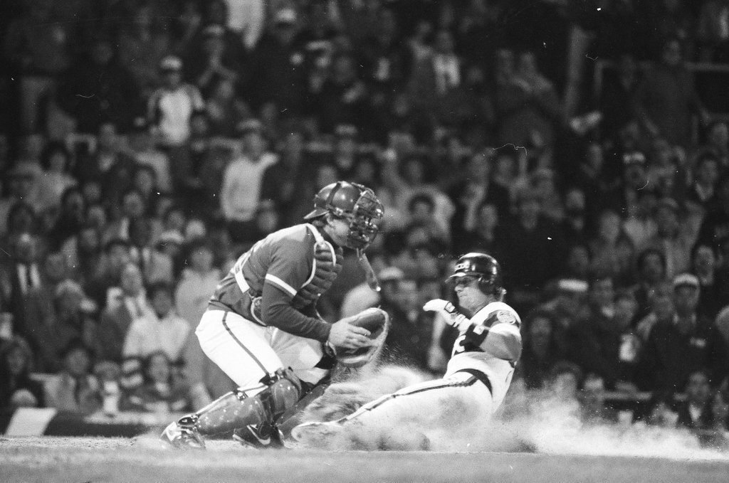 Mayor Harold Washington throws the opening pitch for a baseball game of the Cubs against the White Sox - Chicago Sun-Times