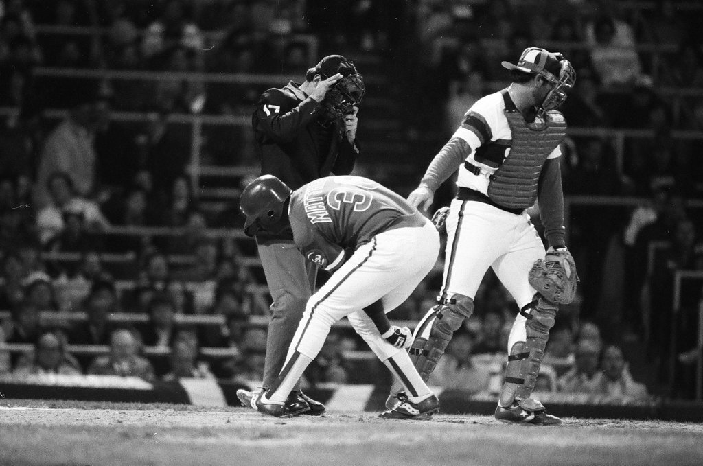 Mayor Harold Washington throws the opening pitch for a baseball game of the Cubs against the White Sox - Chicago Sun-Times