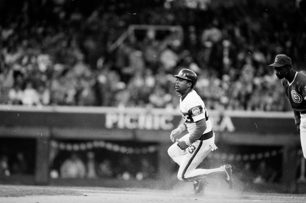 Mayor Harold Washington throws the opening pitch for a baseball game of the Cubs against the White Sox - Chicago Sun-Times