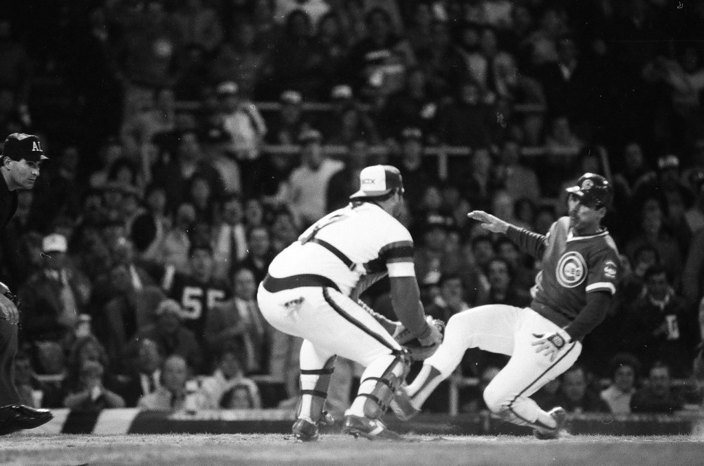 Mayor Harold Washington throws the opening pitch for a baseball game of the Cubs against the White Sox - Chicago Sun-Times