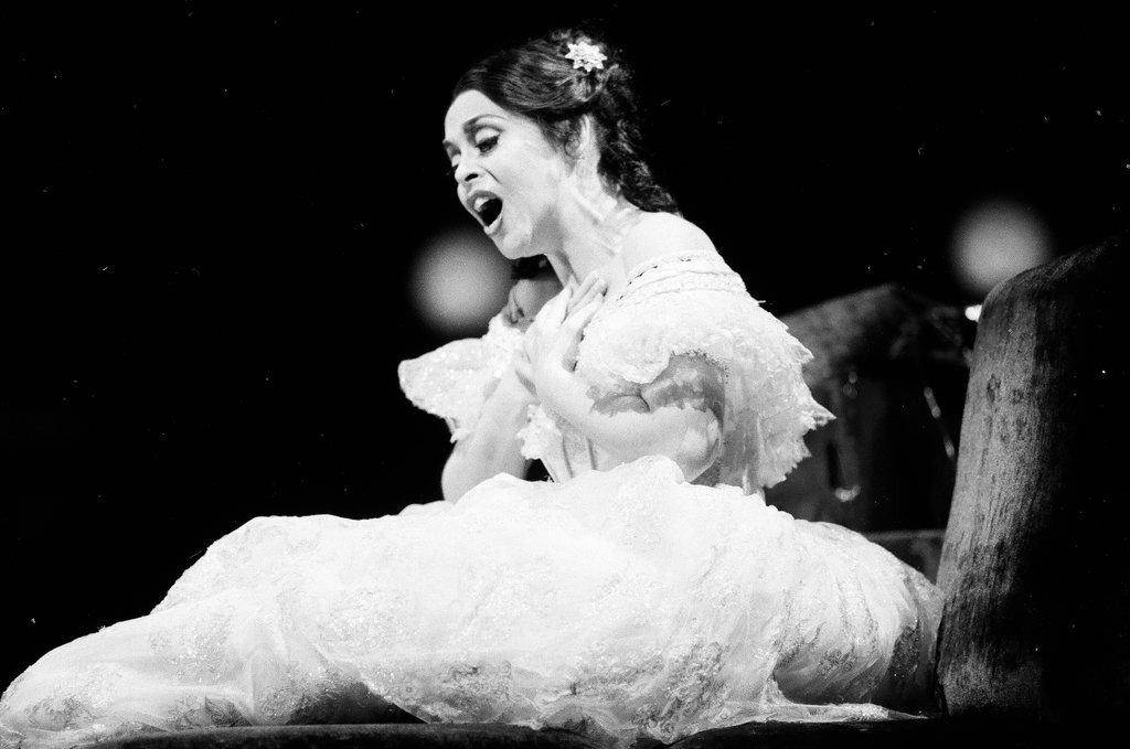 Photographs of a live theatre performance, as well as an organized event at McCormick Center - Chicago Sun-Times