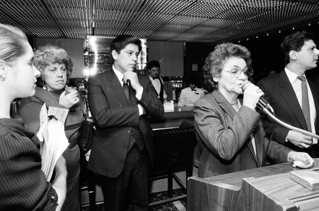 Photographs of a live theatre performance, as well as an organized event at McCormick Center - Chicago Sun-Times