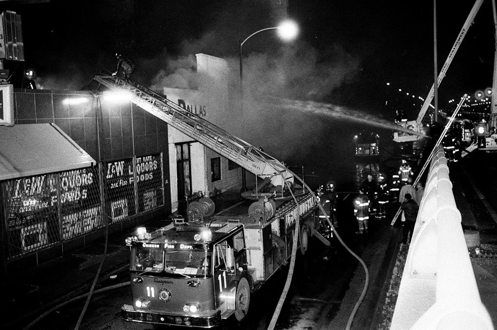 Firefighters battle a fire at a liquor store - Chicago Sun-Times