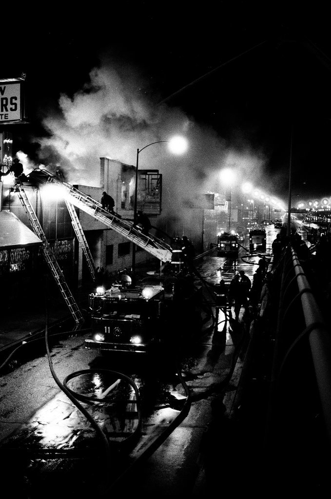 Firefighters battle a fire at a liquor store - Chicago Sun-Times