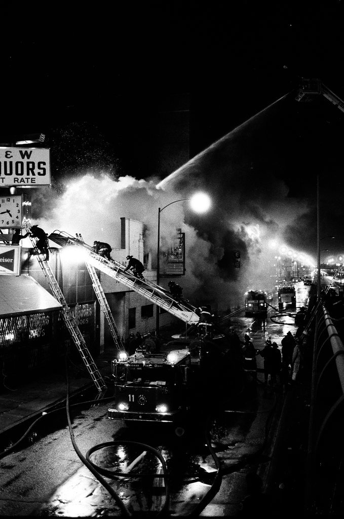 Firefighters battle a fire at a liquor store - Chicago Sun-Times