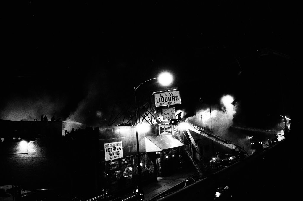 Firefighters battle a fire at a liquor store - Chicago Sun-Times