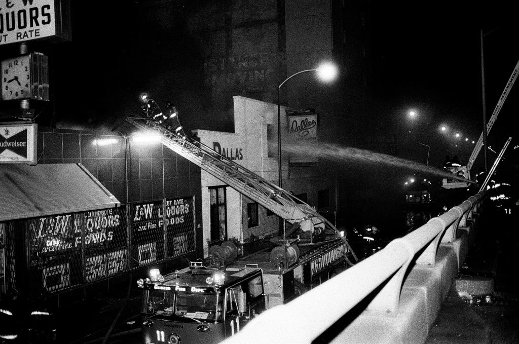 Firefighters battle a fire at a liquor store - Chicago Sun-Times