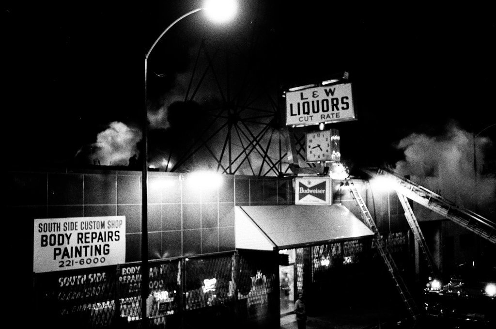 Firefighters battle a fire at a liquor store - Chicago Sun-Times