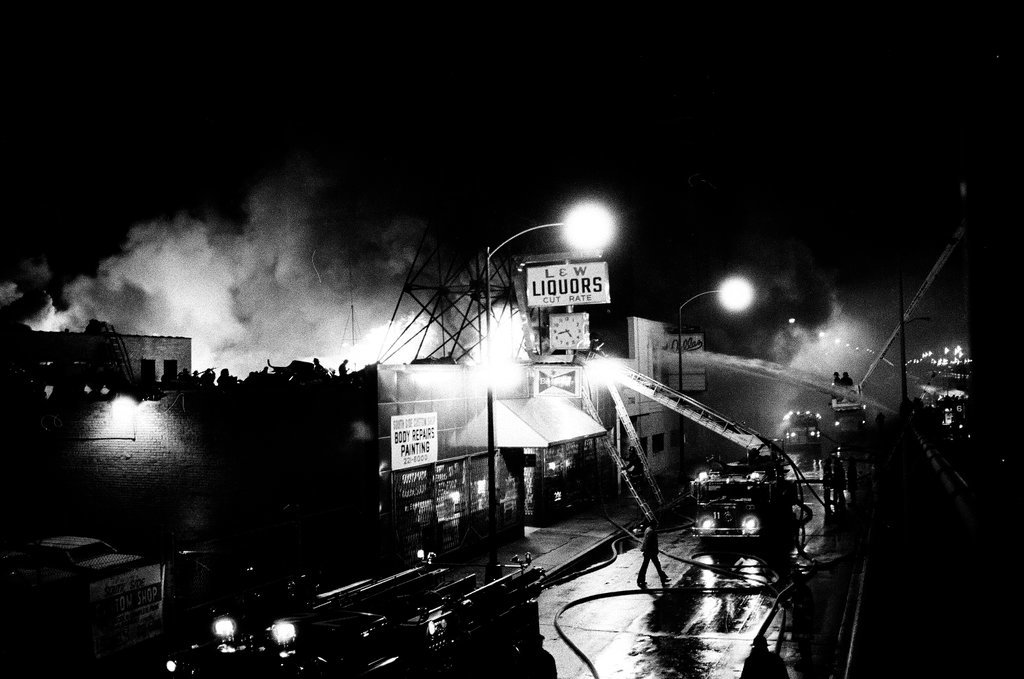 Firefighters battle a fire at a liquor store - Chicago Sun-Times