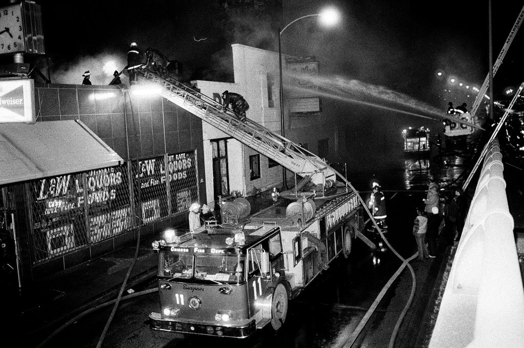 Firefighters battle a fire at a liquor store - Chicago Sun-Times