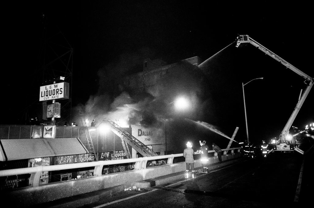Firefighters battle a fire at a liquor store - Chicago Sun-Times