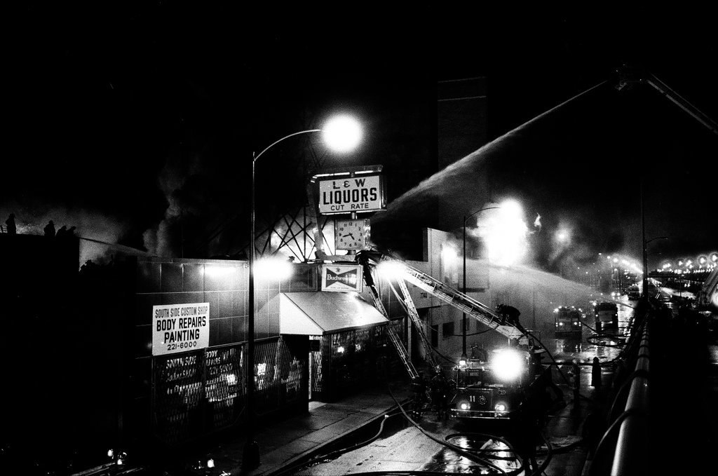 Firefighters battle a fire at a liquor store - Chicago Sun-Times