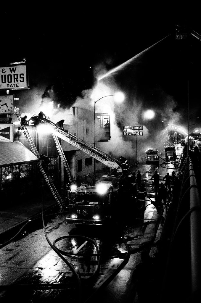 Firefighters battle a fire at a liquor store - Chicago Sun-Times