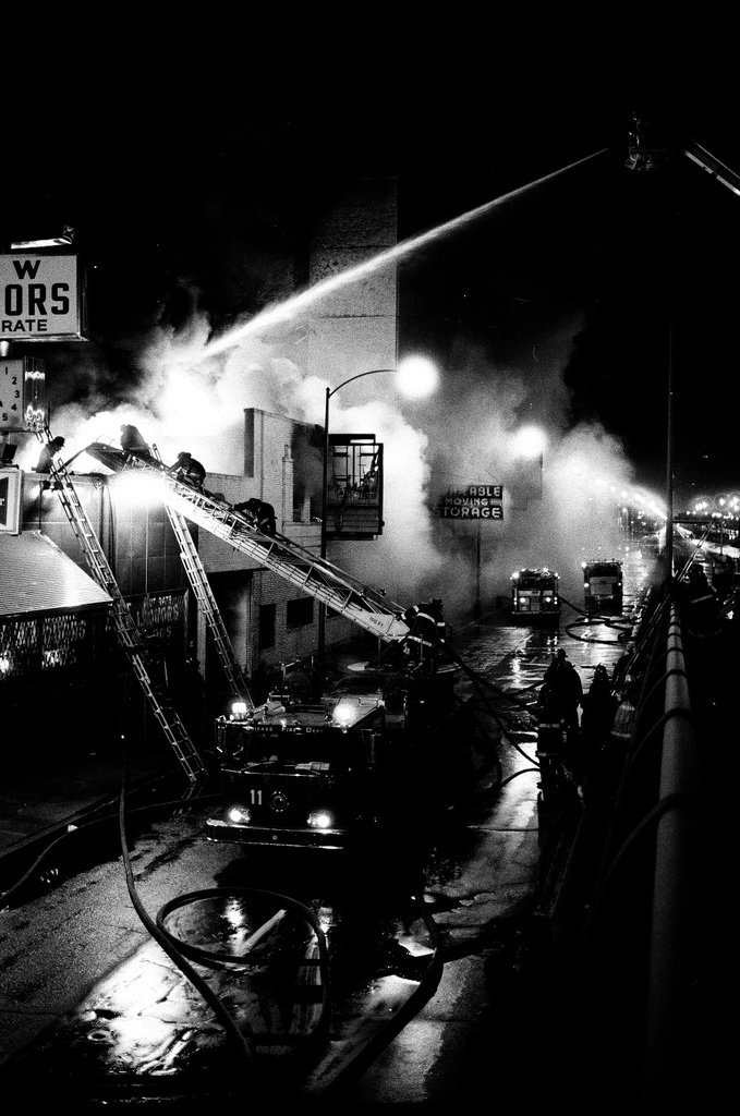 Firefighters battle a fire at a liquor store - Chicago Sun-Times